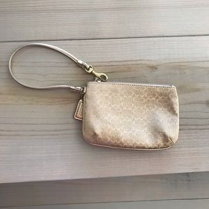 Coach wristlet in gold